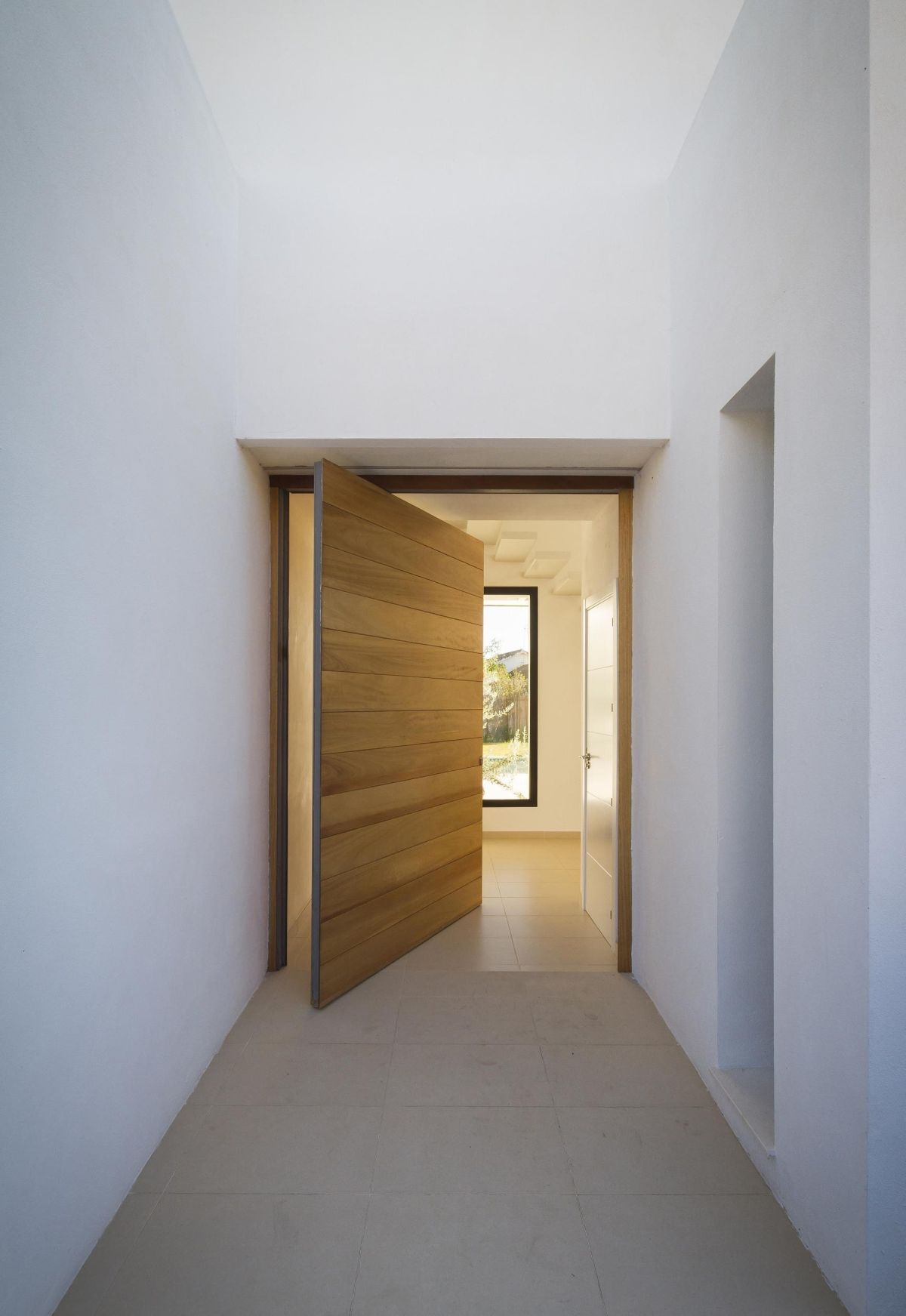 Ramos residence wood entry door