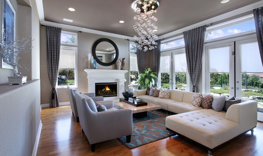 Modern living room residence featuring an white fireplace