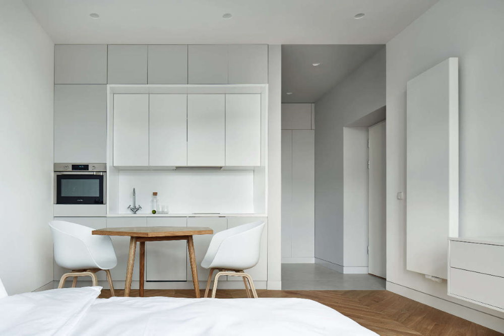 Кухонная зона квартиры в стиле минимализма