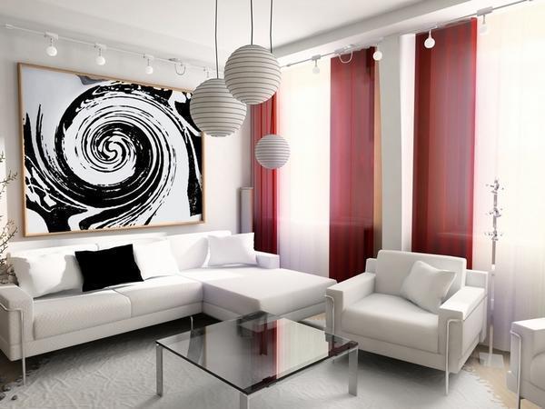 Обставляя черно-белую гостиную, специалисты рекомендуют подбирать мебель белого цвета