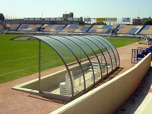 Curved solid polycarbonate sheets in a sports ground
